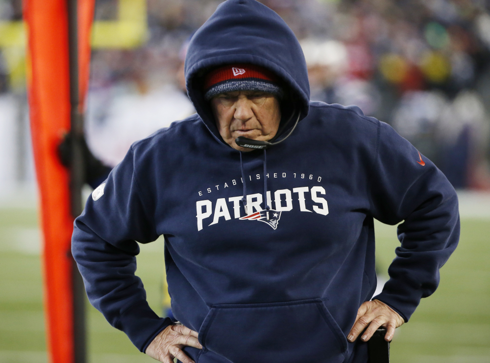 New England Patriots head coach Bill Belichick walks along the sideline in the first half of last week’s game against the Baltimore Ravens. The Patriots play the Indianapolis Colts on Sunday in the AFC Championship game.