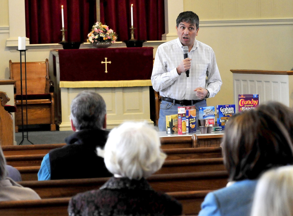 Staff photo by David Leaming
Chris Magri addresses attendees of a Martin Luther King Day service Monday at Henderson Memorial Baptist Church in Farmington.