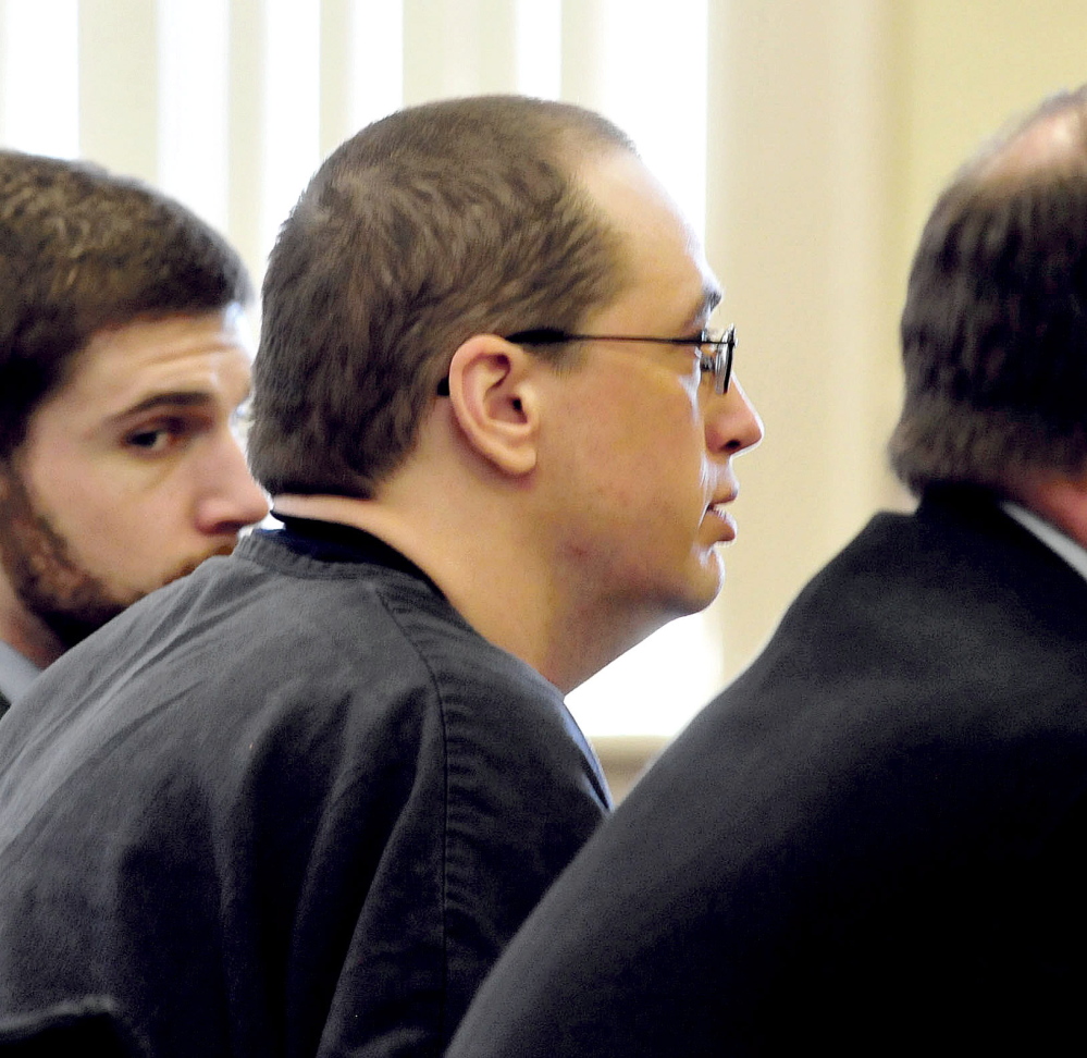 Defendant Jonathan Clark, center, pleads guilty Wednesday to gross sexual assault and related charges in Franklin Superior Court in Farmington.