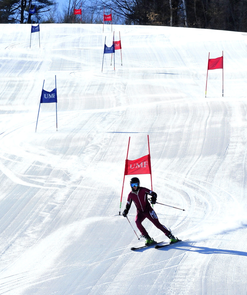 University of Maine at Farmington student Matt Lulofs takes a run down a trail Wednesday at Titcomb Mountain in Farmington shortly after the university’s Alpine Operations Certificate program was announced.