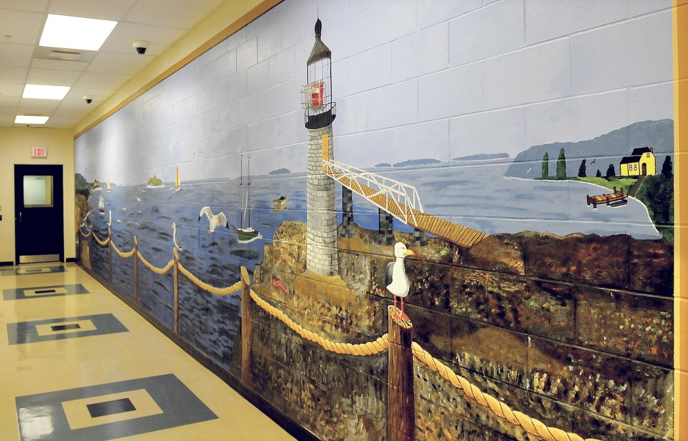 This Maine coastal scene painted by an inmate stretches 30 feet on a wall at Somerset County Jail in East Madison.