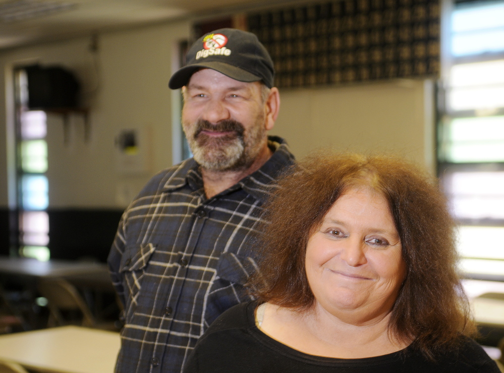 Nelson and Sherry Lavigne, at the Winthrop Hot Meal Kitchen on Thursday, were delivering meals Wednesday when they found 99-year-old Gordon Alcott lying outside on his back porch, unable to get back in the house.