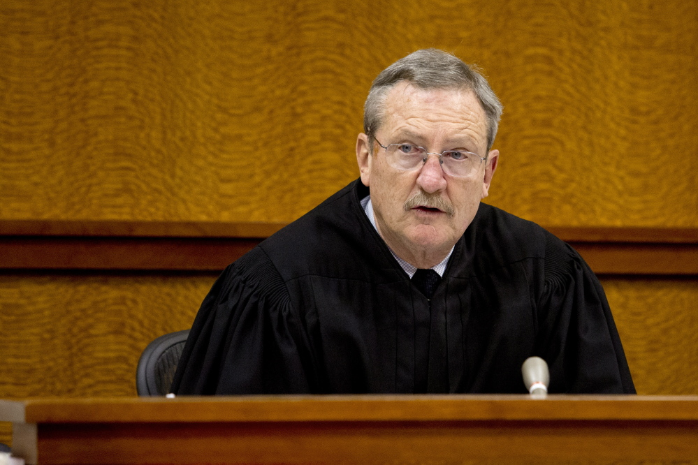 Judge E. Paul Eggert heard the case Monday, telling Sineni that as an attorney he should have known better.