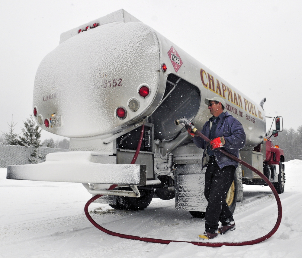 Danny Chapman delivers fuel to Fuller’s Market on Friday in West Gardiner.
