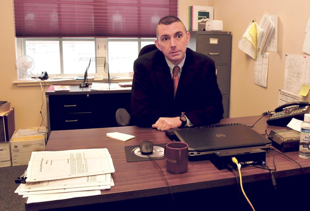 Michael Pike talks about his new position as domestic violence investigator for the Somerset County district attorney’s office in Skowhegan on Monday.