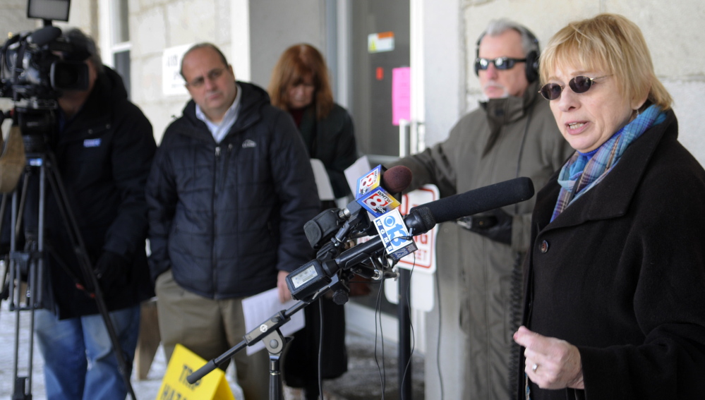 Attorney General Janet Mills announced a settlement Wednesday between the federal Department of Justice and Standard & Poor’s financial services on the steps of the Kennebec County Courthouse in Augusta. Maine joined the justice department and several other states in threatening to litigate against S&P for its rating of mortgage-backed assets that prosecutors claim contributed to the credit crisis of 2008.