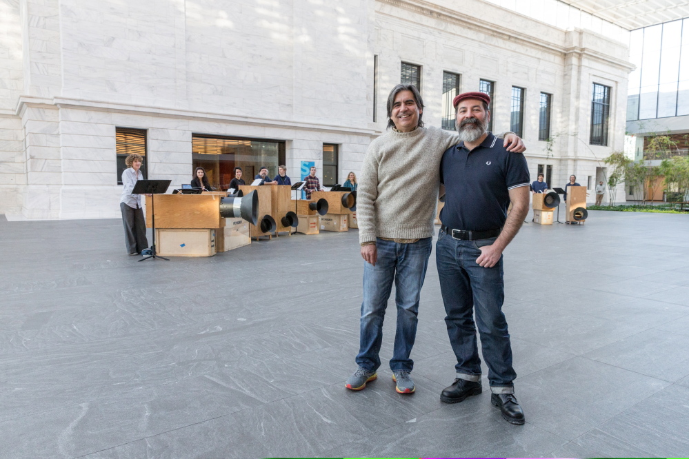University of Maine at Farmington professor Gustavo Aguilar, left, with director Luciano Chessa at a practice.