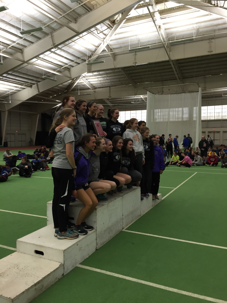 Staff photo by Travis Lazarczyk 
 The Waterville girls indoor track team celebrated its Kennebec Valley Athletic Conference Class B championship Saturday at Bates College in Lewiston.