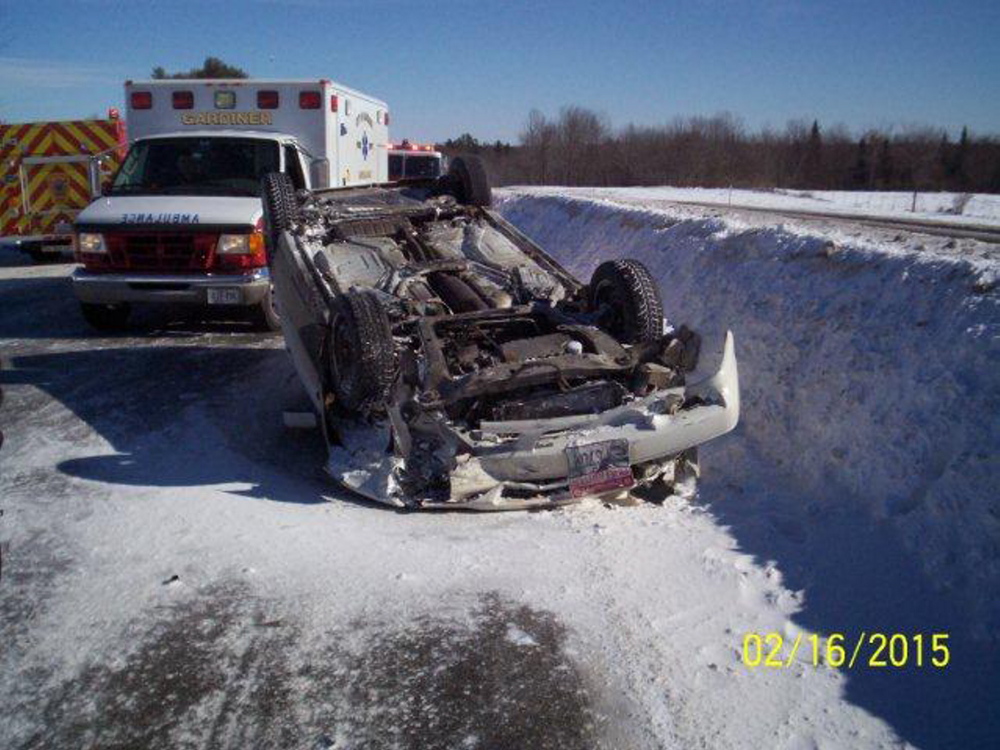 This Volvo overturned after the driver struck drifting snow Monday morning in the southbound lanes of the Maine Turnpike in Litchfield, leading to a four-vehicle crash that sent four people to area hospitals by ambulance.