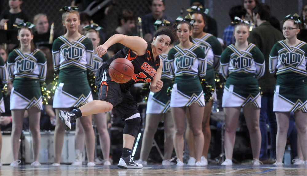 Gardiner Area High School’s Savannah Vinton-Mullens (22) tries to save the ball against Mount Desert Island High School in the second half of an Eastern Class B quarterfinal game Saturday at the Cross Insurance Center in Bangor. Ninth-seeded Gardiner upset top-ranked MDI 62-50 and will play No. 4 Camden Hills at 3:35 p.m. today.