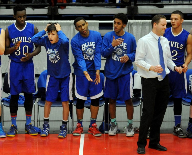 Lewiston High School reacts to losing the lead in the fourth quarter to Hampden Academy in the Eastern A title game on Saturday.