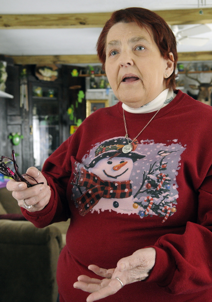 Deer Ridge Mobile Home Park co-op board secretary Beverly Chase, left, speaks during an interview on Thursday in Augusta.