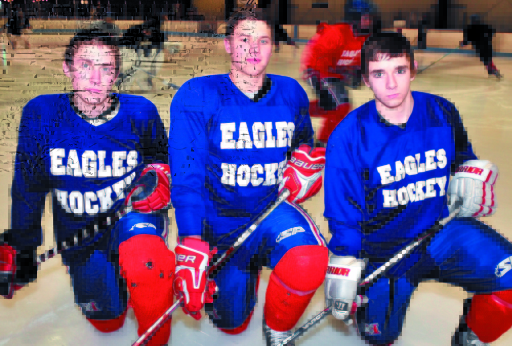 Staff photo by David Leaming 
 Former Messalonskee High School hockey players, from left, Chase Cunningham, Sam Dexter and James Varney left their marks on the program.