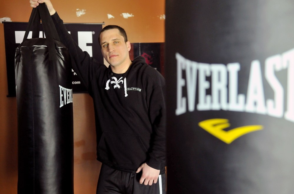 Justin Rolfe poses in his Fairfield home on Feb. 27. Rolfe recently had a victory in the New England novice championships in Lowell, Mass.