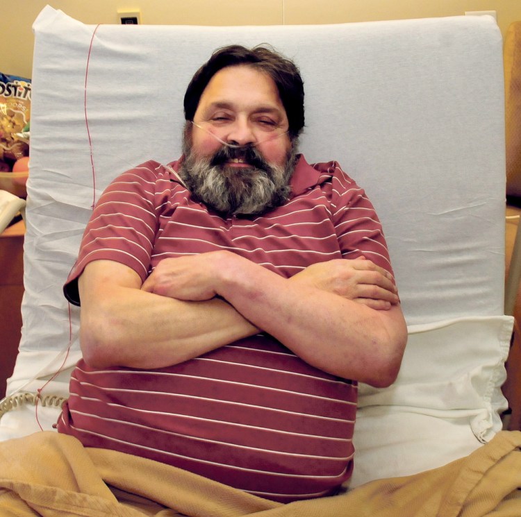 Danny Karter, former teacher and Waterville police officer, in his room at Oak Grove Center rehabilitation facility in Waterville on Monday.