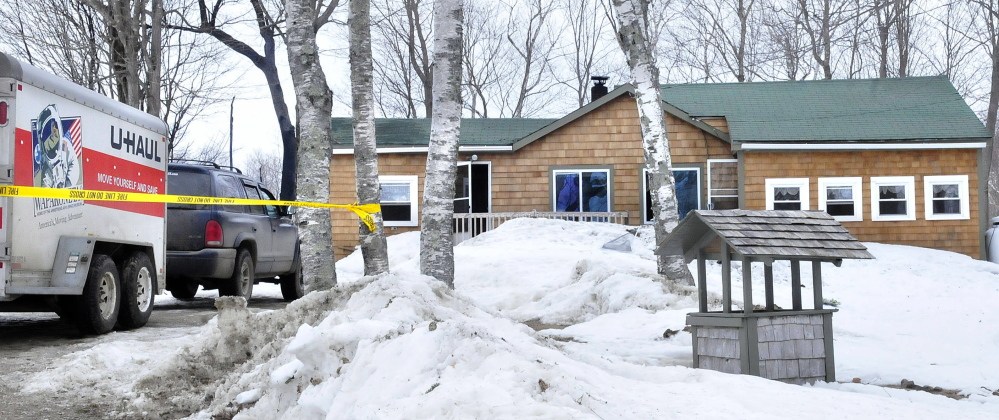 Police tape blocks access to a home and vehicles Saturday on East Gulch Road in Thorndike, where fire caused serious damage to the home and a shed. At the scene, Waldo County Sheriff’s Deputy Jim Porter said investigators think the fire was set intentionally. Firefighters arrived to find a man threatening to kill them if they put out the fire, according to Chief George Russell, of the Thorndike Fire Department.