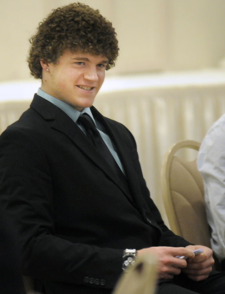 Lawrence/Skowhegan senior forward Cody Martin enjoys his time at the Travis Roy Award ceremony Sunday in Lewiston. Martin was a finalist for the award.
