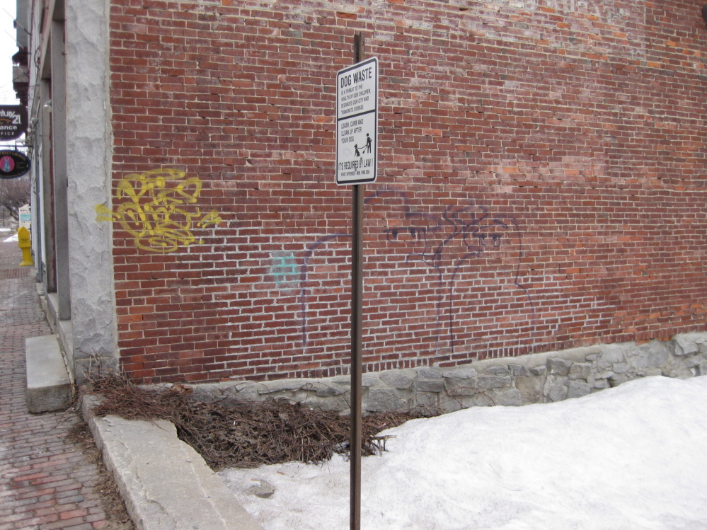 The side of the building at 110 Water St. was tagged with graffiti Monday night.