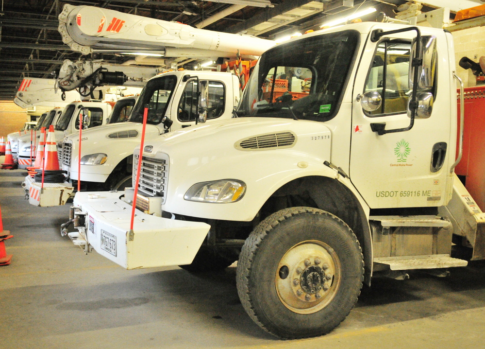 Rows of vehicles are parked at Central Maine Power’s Augusta Service Building on Old Winthrop Road in this 2014 file photo.