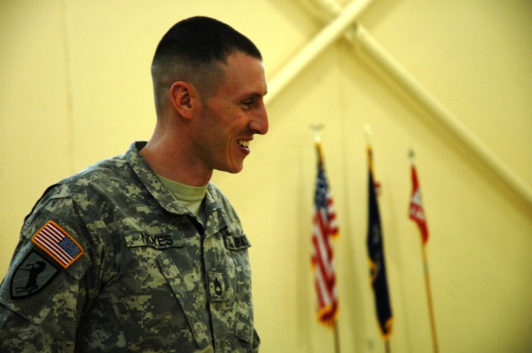 Sgt. 1st Class Tenney Noyes, of Canaan, a member of the 136th Vertical Engineer Co. of the Maine Army National Guard, speaks at the Skowhegan unit’s headquarters Friday.