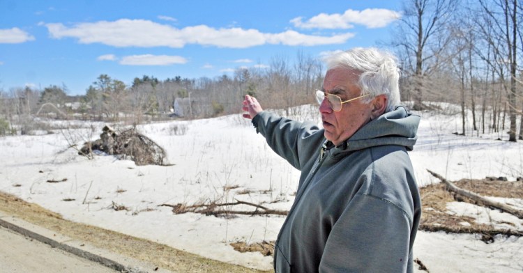 Dan Moscato talks about a solar power development proposed for a field near his home on Tuesday in Washington. The town is holding a special town meeting next week, at which selectmen are seeking a six-month moratorium on such developments to give the Planning Board time to review any concerns the town might have.