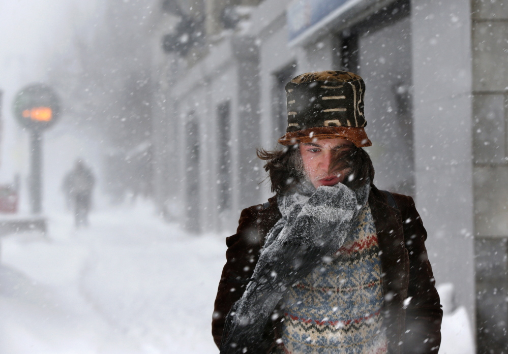 Dylan Chestnutt endures wind-whipped snow and single-digit temperatures during a storm in Portland on Feb. 2. For Portland and many other cities in the Northeast, it was the coldest February on record.