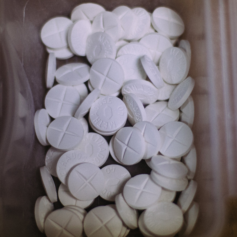 Methadone tablets at the CAP Quality Care clinic in Westbrook. People opposed to  Gov. LePage’s bid to eliminate coverage for methadone turned out in force in Augusta Thursday. Whitney Hayward/2015 Press Herald file  