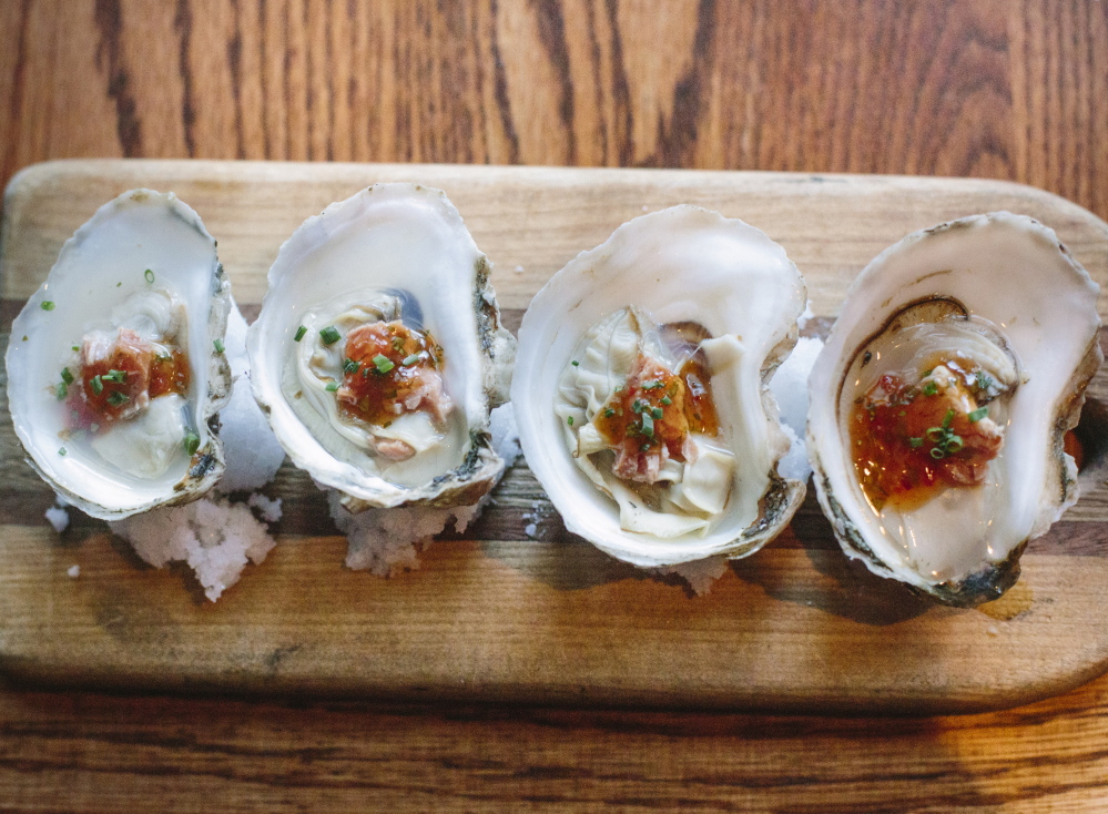 Wood-oven roasted oysters.