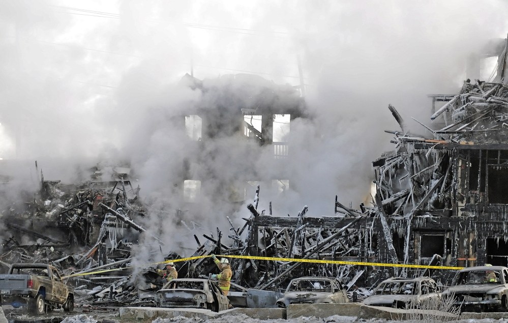 Firefighters fought an 18-unit apartment building fire on Friday, Dec. 5, 2014, on Northern Avenue in Augusta. The call came in around 2 a.m., according to Fire Chief Roger Audette. He said that police and firefighters helped 23 people escape and seven were taken to MaineGeneral to be treated for minor injuries, smoke inhalation or hypothermia.