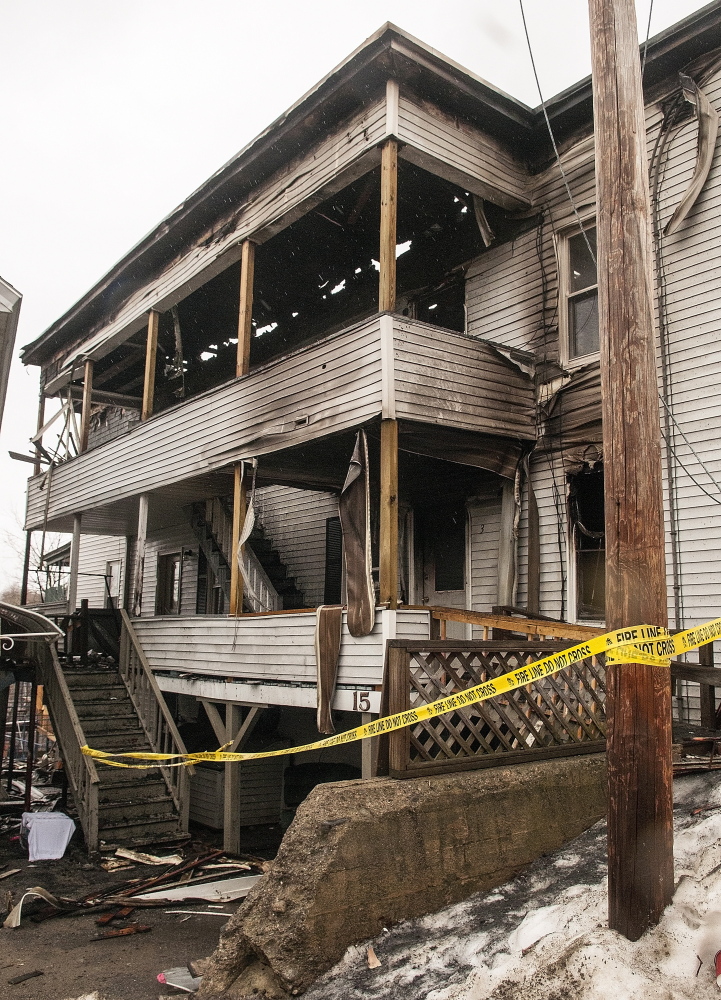 The city has determined that this apartment building at 15 State St. must be torn down after a Friday night fire.