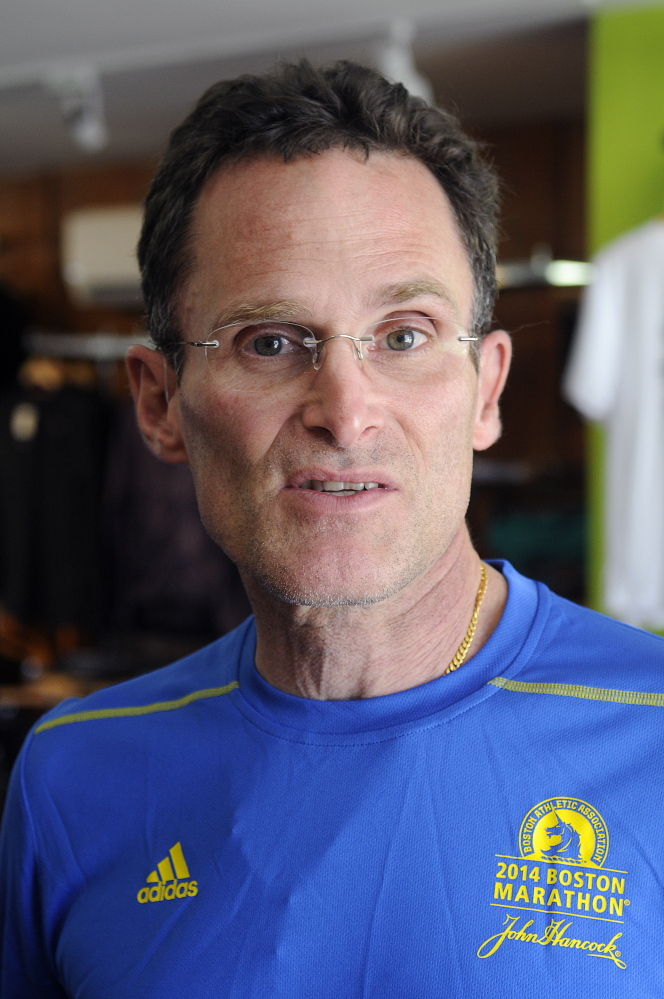 Brian Morin discusses the closure of Granite City Running in Hallowell on Sunday.