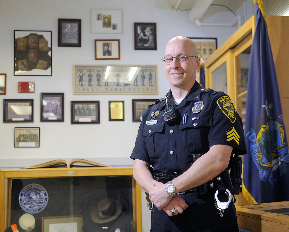 Augusta Police Department Sgt. Christian Behr has organized a mini-museum that takes up half the department’s break room.