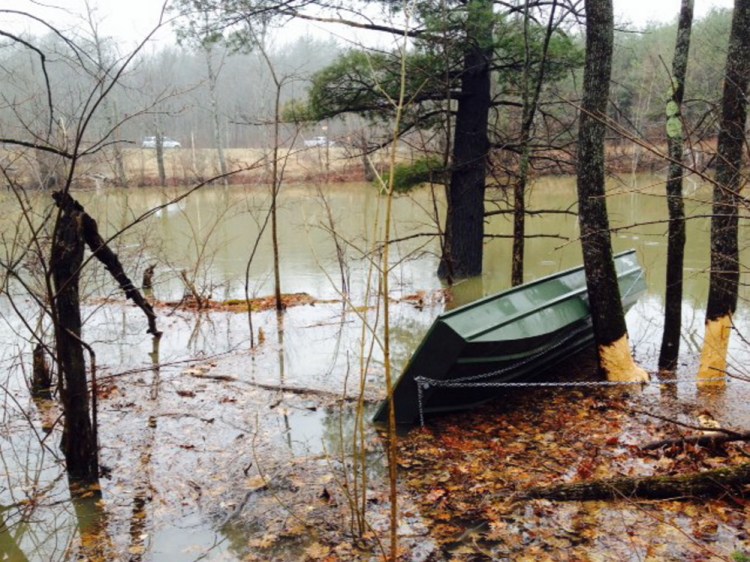 A boat that had been tied to a tree on the banks of Messalonskee Stream in Waterville appeared to have capsized, prompting an emergency response Tuesday in Waterville. 