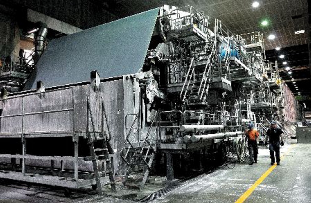A papermaking machine at the Sappi Fine Paper mill in Skowhegan. The town Board of Assessors unanimously rejected a bid by Sappi for a reduction in the valuation of its real estate and equipment at the mill for tax purposes. The company plans to appeal.