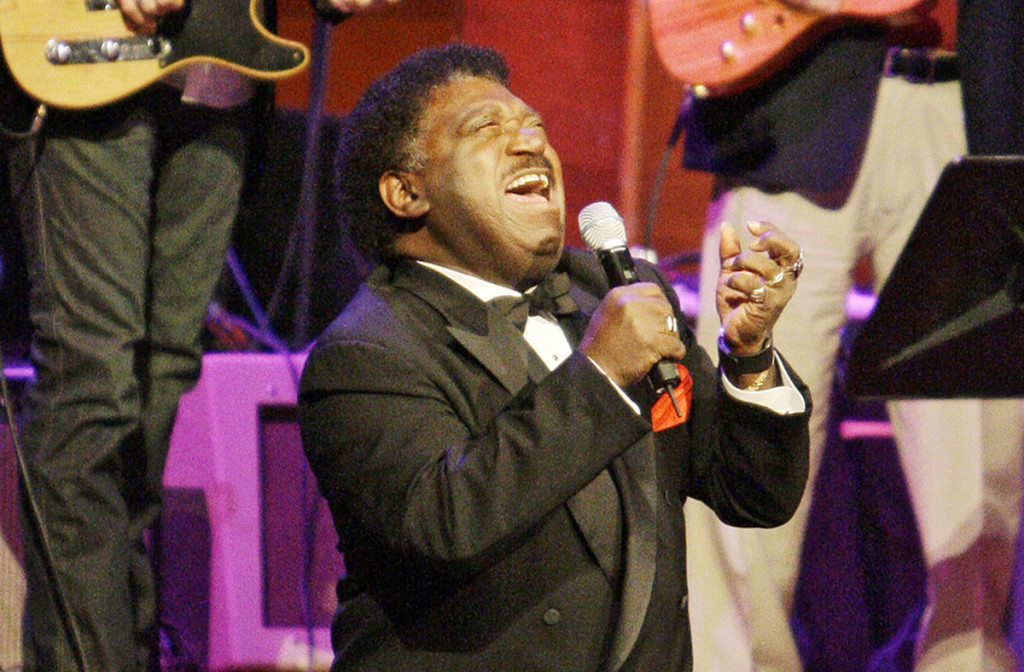 Percy Sledge performs "When a Man Loves a Woman" along with the Muscle Shoals Rhythm Section at the Musicians Hall of Fame awards show in Nashville, Tenn., on Oct. 28, 2008. The Associated Press