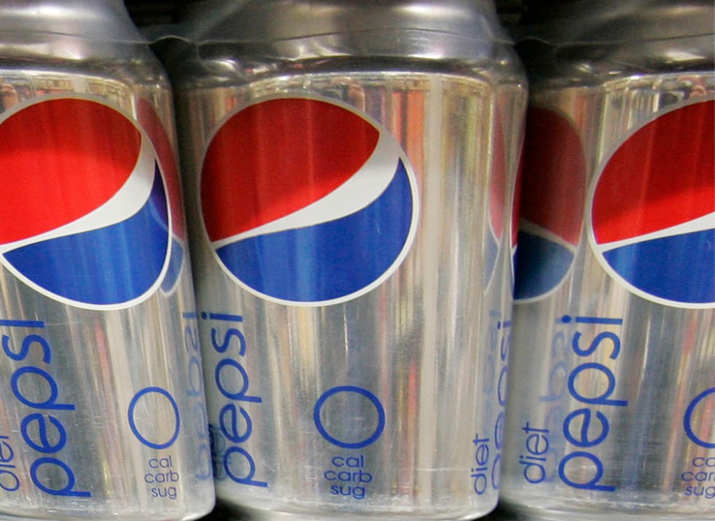 Diet Pepsi drinks on display at a market  in Palo Alto, Calif.  The decision to swap sweeteners comes as Americans keep turning away from popular diet sodas. Coca-Cola said this week that sales for Diet Coke fell 5 percent in North America in the first three months of the year. The Associated Press