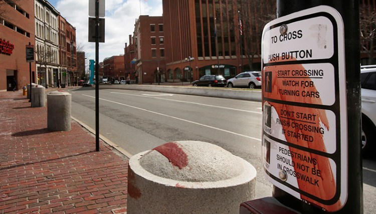 Signs, posts and shop windows in areas of the Old Port were streaked with blood or a substance that looks like blood.