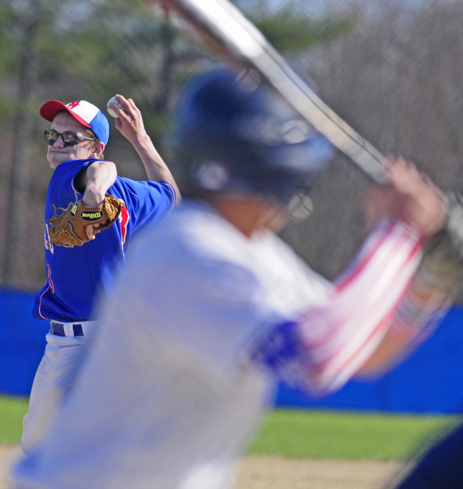 Oak Hill’s Jake Bannister throws a pitch to the plate during a game against Dirigo on in Wales.