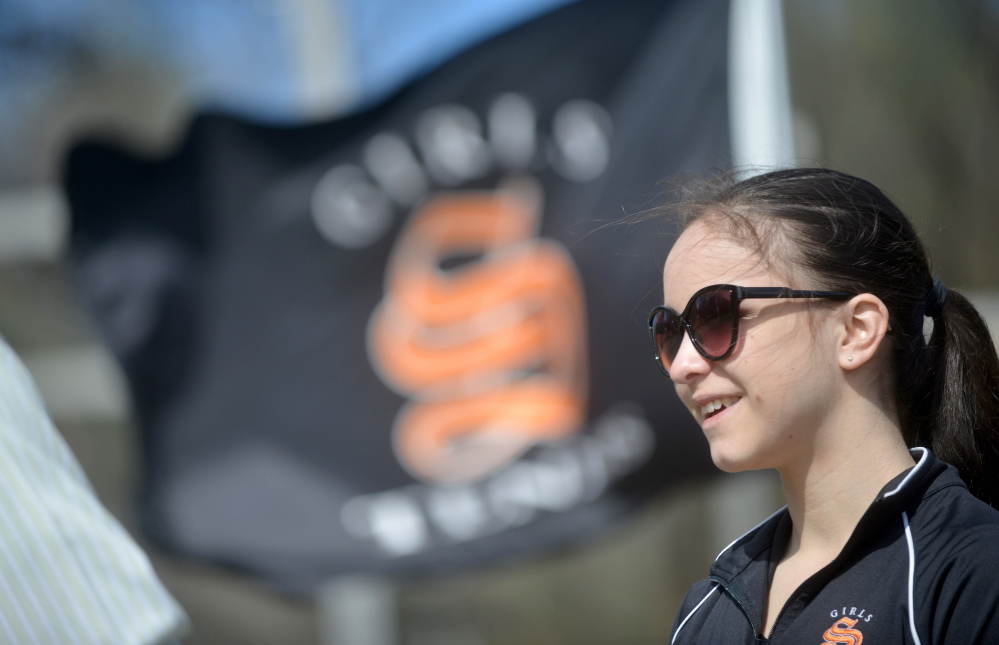 Staff photo by Michael G. Seamans 
 Skowhegan Area High School's Vasilisa Mitskevich prepares for a tennis match in Skowhegan last week.
