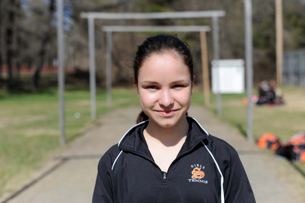 Staff photo by Michael G. Seamans
Skowhegan Area High School’s Vasilisa Mitskevich prepares for a tennis match in Skowhegan last week. The Russian exchange student plays No. 1 singles for the Indians.