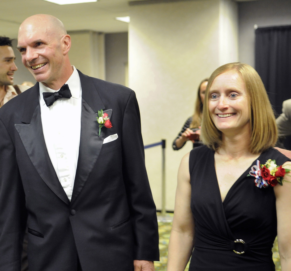 Staff photo by Andy Molloy
Eric Weinrich and Marcie Lane Schulenberg talk with friends after being inducted into the Maine Sports Hall of Fame on Sunday at the Augusta Civic Center. Weinrich played 17 seasons in the NHL. Schulenberg won two Gold Balls for Cony basketball, leading the Rams to an 83-4 record over her four years there.