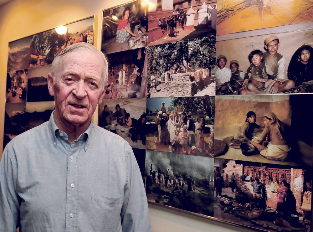 Peter Prindle, a former Colby College professor, seen here in his Waterville home, said Tuesday Nepal’s two recent earthquakes present special challenges for the country.