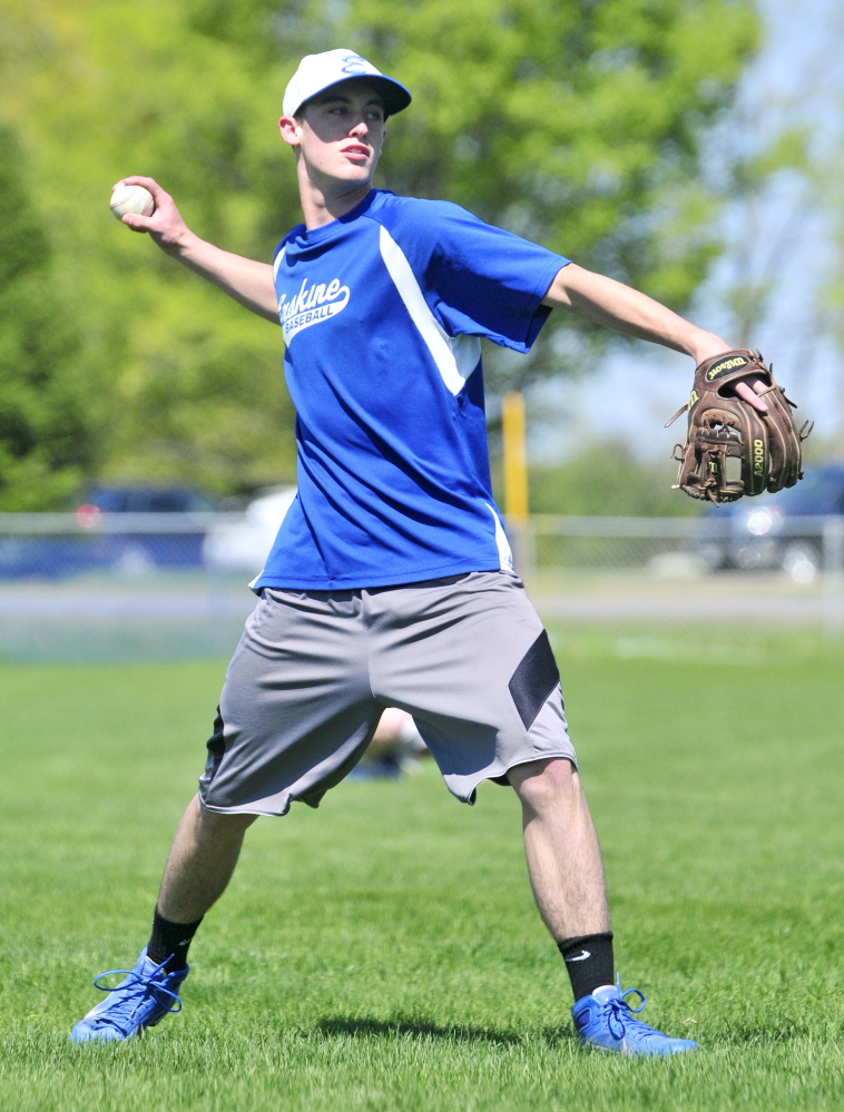 Ryan Rodrigue plays catch during Erskine Academy baseball practice Thursday in South China.