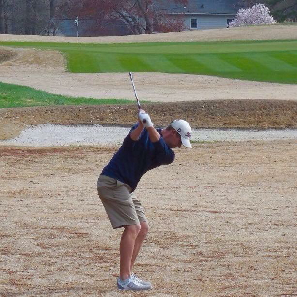 Contributed photo 
 Toby Spector takes a swing on the fifth hole of the second round of a GPro Tour tournament at Forest Oaks Country Club in Greensboro, N.C., on March 25. Spector, 28, of Waterville, finished the event 4-under par 212, which was good for 7th place.