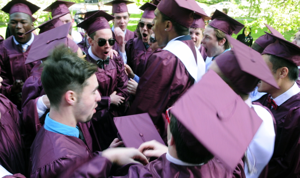 Kents Hill School senior boys do a spirit yell before their graduation Saturday in Readfield.