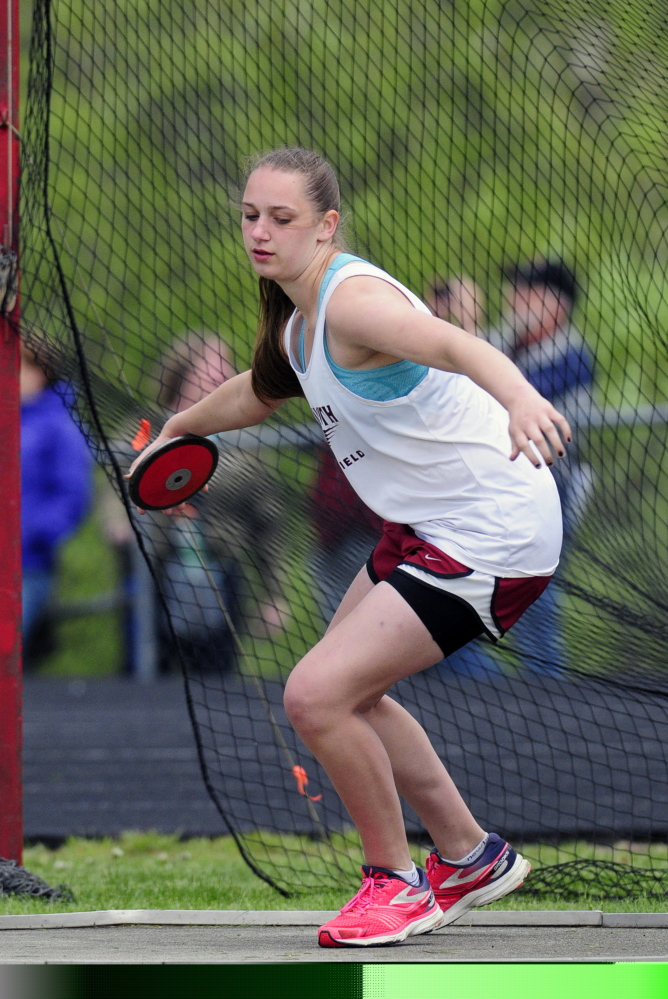 Monmouth’s Maddie Amero throws the discus during the Capital City Classic at Cony last Friday.