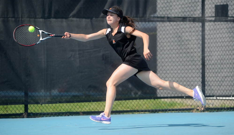 Skowhegan Area High School’s Vasilisa Mitskevich competes against Greely High School’s Izzy Evans on Saturday at Colby College in Waterville.