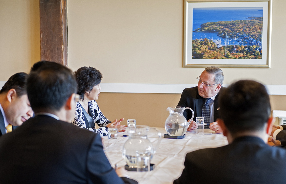 Gov. Paul LePage, right, talks with Zhang Qiyue, the Chinese consul general in New York, during Maine International Trade Day on Thursday. About 350 people attended the annual event.
Claudia Dricot photo