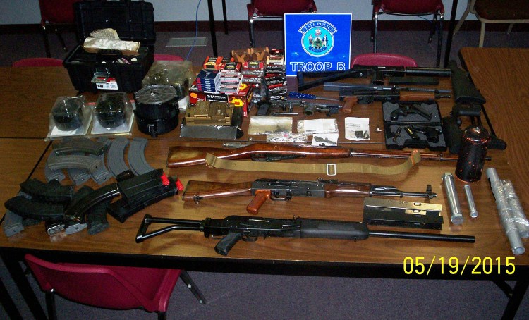 Police say Guy Schultz of Leeds had handguns, rifles and shotguns in his home, and equipment like silencers.