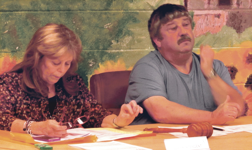 SAD 58 Superintendent Erica Brouillet and board member Dan Worcester are seen during a budget meeting in Salem on Tuesday evening.